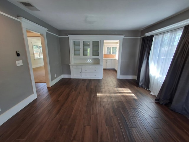 535 E Princeton Ave, Fresno, CA 93704 - empty room featuring plenty of natural light and dark wood-style floors
