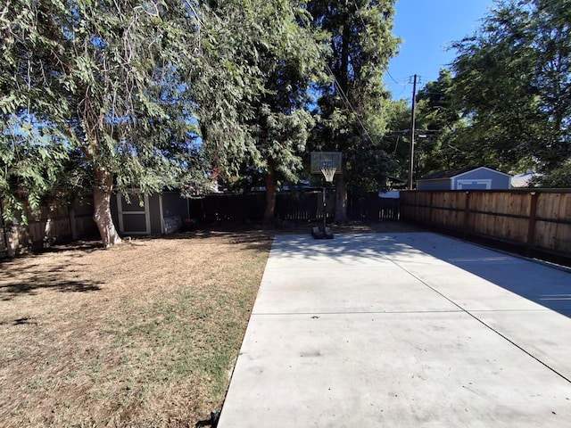 535 E Princeton Ave, Fresno, CA 93704 - fenced backyard with a patio area and an outdoor structure