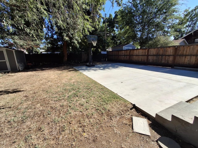 535 E Princeton Ave, Fresno, CA 93704 - fenced backyard with a shed and basketball hoop
