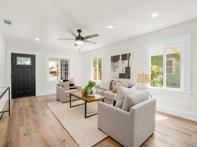 3644 E Illinois Ave, Fresno, CA 93702 - living area with light wood-type flooring, recessed lighting, and ceiling fan