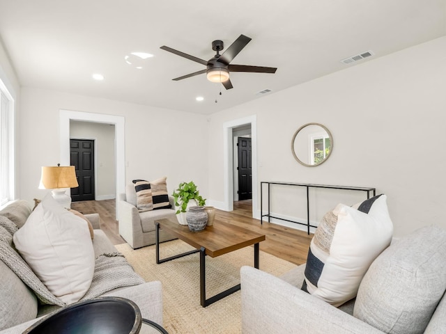 3644 E Illinois Ave, Fresno, CA 93702 - living area with light wood finished floors, recessed lighting, and a ceiling fan