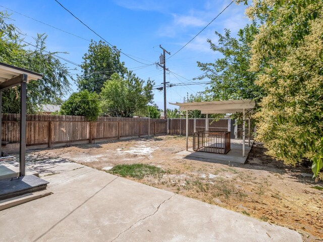 3644 E Illinois Ave, Fresno, CA 93702 - fenced backyard featuring a patio
