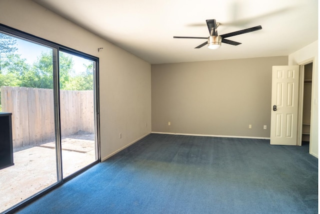 38475 Sierra Lakes Dr, Oakhurst, CA 93644 - empty room featuring a ceiling fan and dark colored carpet