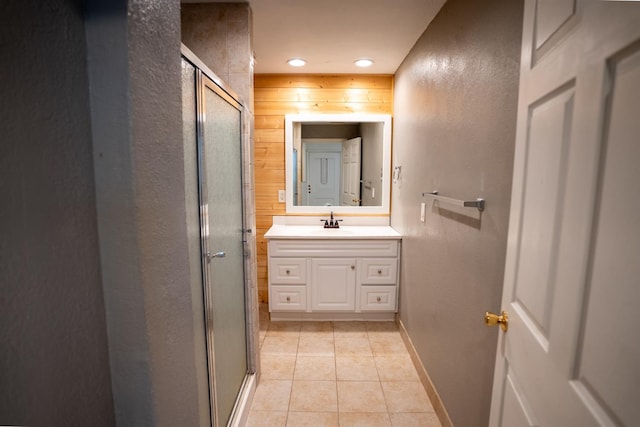 38475 Sierra Lakes Dr, Oakhurst, CA 93644 - bathroom featuring vanity, a stall shower, tile patterned floors, a textured wall, and recessed lighting