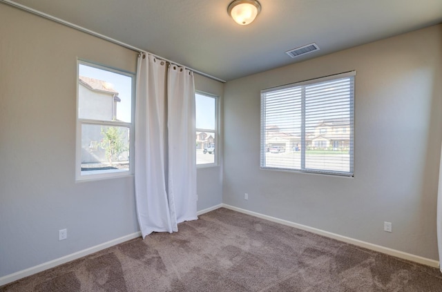 1072 Soledad Ave, Clovis, CA 93619 - spare room featuring carpet floors and baseboards