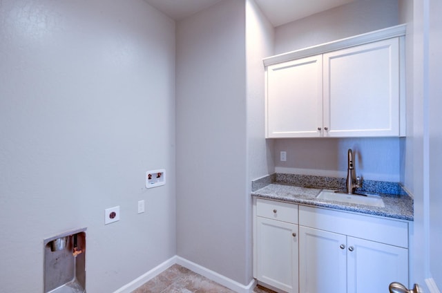 1072 Soledad Ave, Clovis, CA 93619 - washroom with electric dryer hookup, washer hookup, and cabinet space