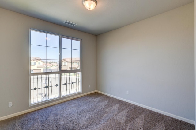 1072 Soledad Ave, Clovis, CA 93619 - carpeted spare room featuring baseboards