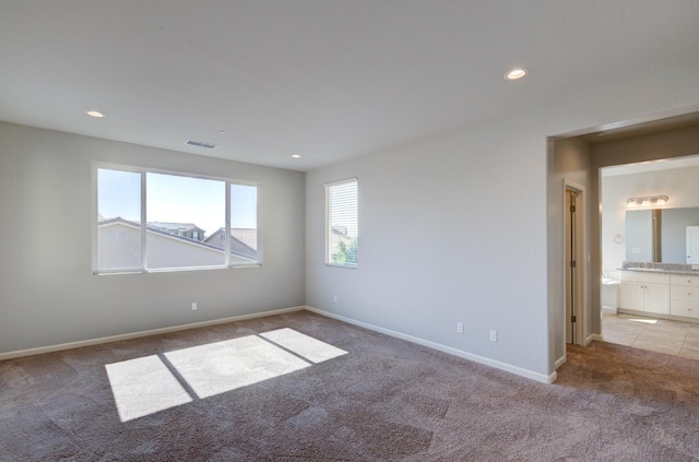1072 Soledad Ave, Clovis, CA 93619 - spare room with carpet flooring and recessed lighting