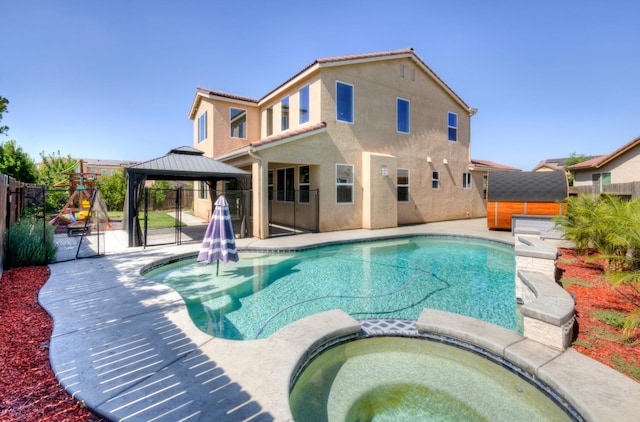 1072 Soledad Ave, Clovis, CA 93619 - view of pool featuring a gazebo, a pool with connected hot tub, and a patio area