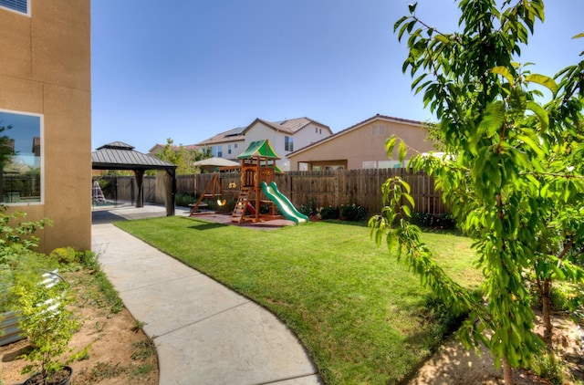 1072 Soledad Ave, Clovis, CA 93619 - fenced backyard with a gazebo, a playground, and a patio area