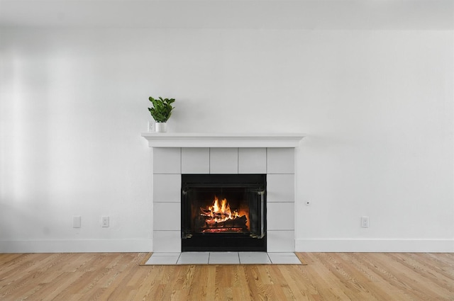 13570 7th, Parlier, CA 93648 - detailed view of a tile fireplace and wood finished floors