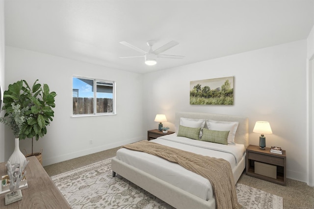 13570 7th, Parlier, CA 93648 - carpeted bedroom with baseboards and a ceiling fan