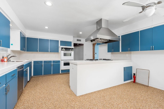 4760 N Rowell Ave, Fresno, CA 93726 - kitchen with island range hood, blue cabinets, white appliances, recessed lighting, and a peninsula
