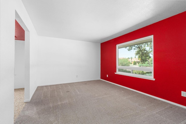 4760 N Rowell Ave, Fresno, CA 93726 - carpeted empty room featuring baseboards