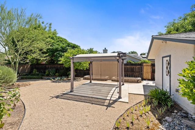 4760 N Rowell Ave, Fresno, CA 93726 - fenced backyard with a patio