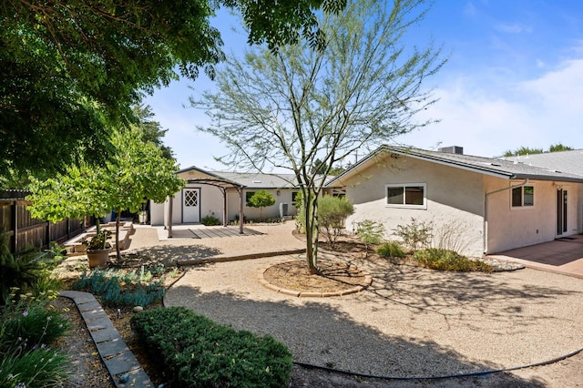 4760 N Rowell Ave, Fresno, CA 93726 - view of yard featuring a storage shed and a patio