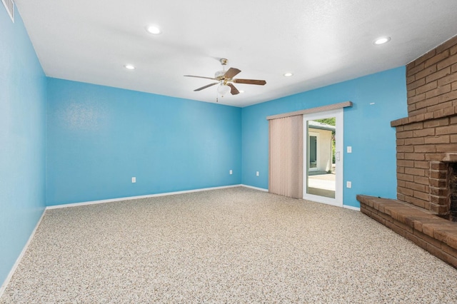 4760 N Rowell Ave, Fresno, CA 93726 - unfurnished living room with ceiling fan, a fireplace, and recessed lighting