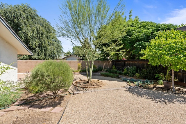 4760 N Rowell Ave, Fresno, CA 93726 - fenced backyard featuring a patio area