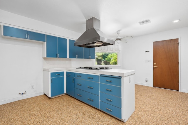 4760 N Rowell Ave, Fresno, CA 93726 - kitchen featuring island range hood, blue cabinetry, white gas cooktop, light countertops, and recessed lighting