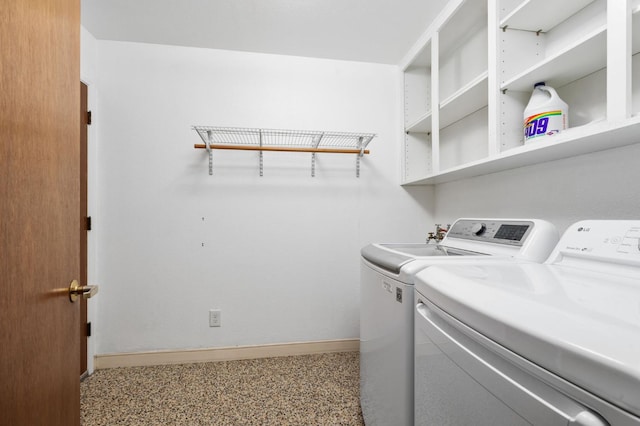 4760 N Rowell Ave, Fresno, CA 93726 - laundry room with washer and clothes dryer and baseboards