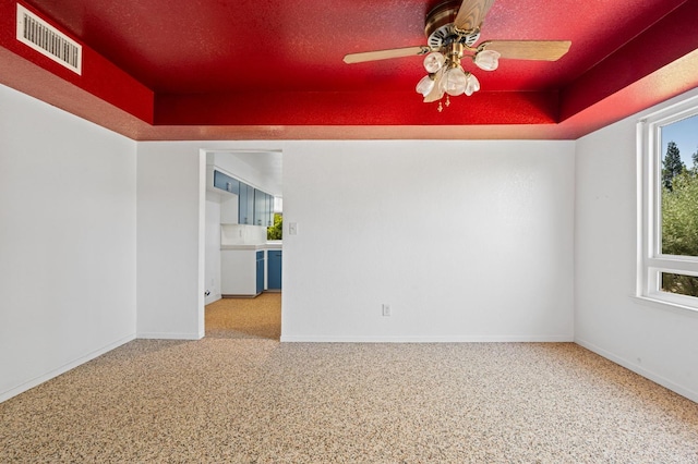 4760 N Rowell Ave, Fresno, CA 93726 - unfurnished room featuring a tray ceiling and ceiling fan