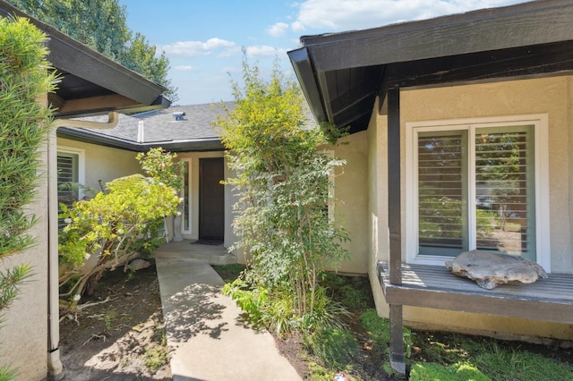 1059 E Fallbrook Ave, Fresno, CA 93720 - view of exterior entry featuring stucco siding