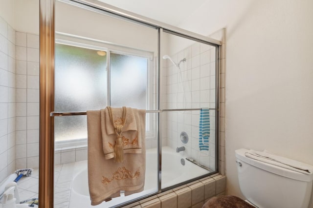 1059 E Fallbrook Ave, Fresno, CA 93720 - bathroom featuring toilet and tiled shower / bath