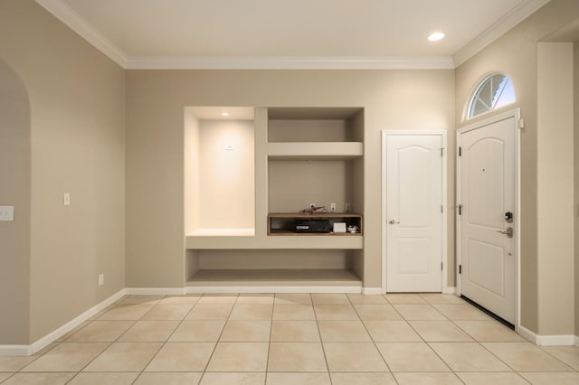 3613 Utah Ln, Clovis, CA 93619 - foyer entrance with ornamental molding, arched walkways, light tile patterned floors, and recessed lighting