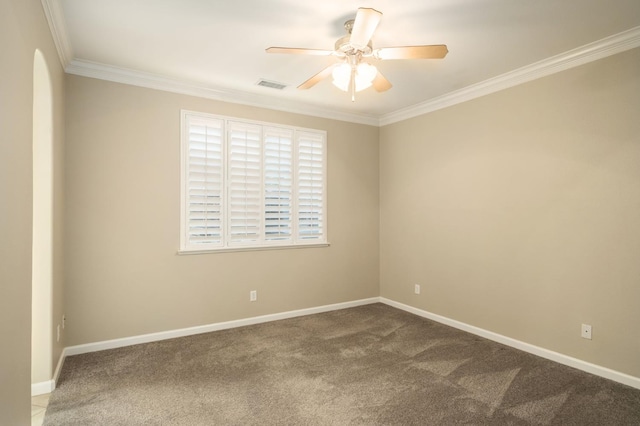 3613 Utah Ln, Clovis, CA 93619 - carpeted empty room with a ceiling fan, crown molding, and arched walkways