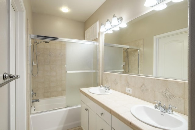 3613 Utah Ln, Clovis, CA 93619 - full bath with combined bath / shower with glass door, decorative backsplash, and double vanity