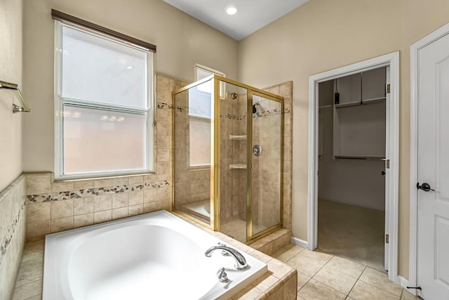 2663 E Spice Way, Fresno, CA 93720 - bathroom featuring a bath, a shower stall, tile patterned floors, a walk in closet, and recessed lighting
