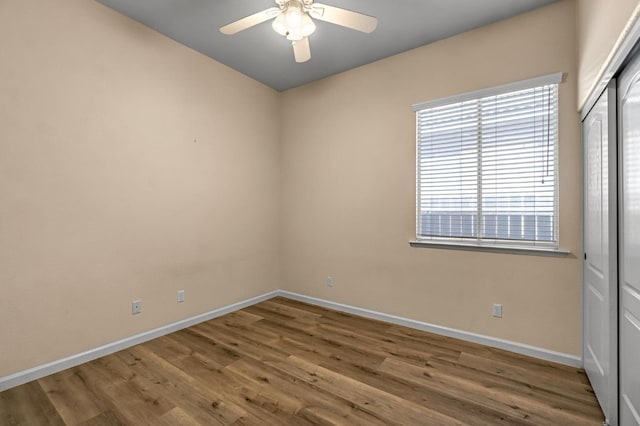 2663 E Spice Way, Fresno, CA 93720 - unfurnished room with healthy amount of natural light, a ceiling fan, and wood finished floors