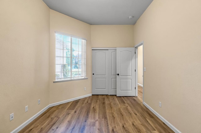 2663 E Spice Way, Fresno, CA 93720 - unfurnished bedroom with wood finished floors and a closet