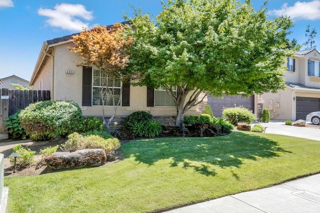 2663 E Spice Way, Fresno, CA 93720 - obstructed view of property featuring concrete driveway and stucco siding