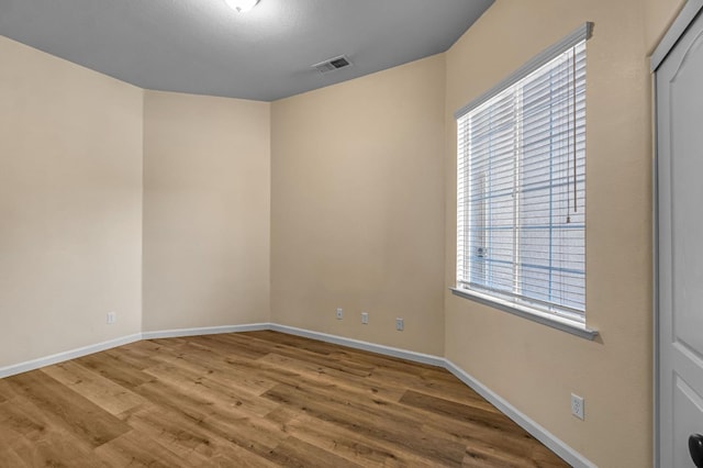 2663 E Spice Way, Fresno, CA 93720 - spare room with wood finished floors and baseboards