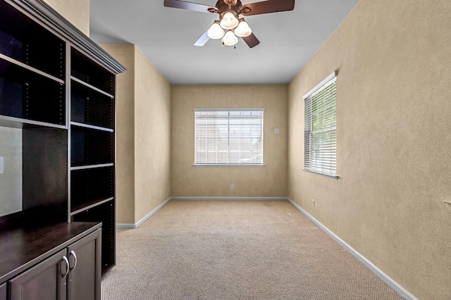 2663 E Spice Way, Fresno, CA 93720 - spare room featuring light carpet, a ceiling fan, and a textured wall