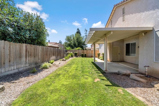 2663 E Spice Way, Fresno, CA 93720 - fenced backyard with a patio