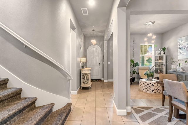 2076 Chennault Ave, Clovis, CA 93611 - foyer featuring light tile patterned floors and stairs