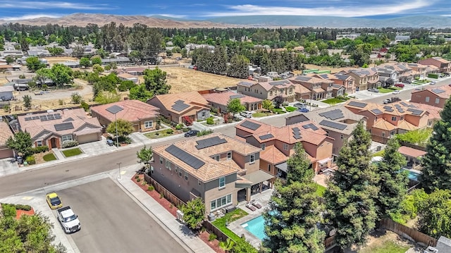 2076 Chennault Ave, Clovis, CA 93611 - aerial view of residential area with mountains and a pool area