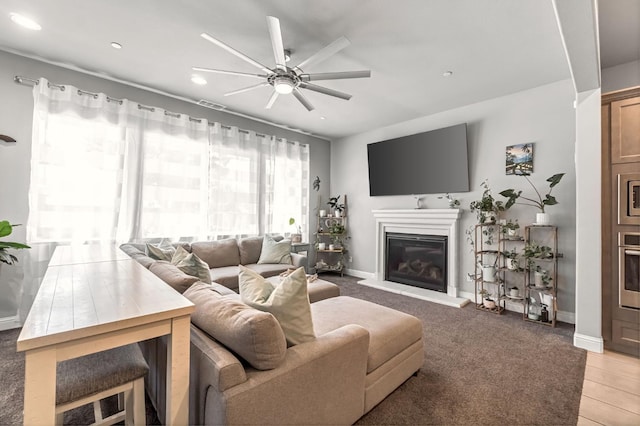 2076 Chennault Ave, Clovis, CA 93611 - living room featuring ceiling fan, recessed lighting, and a glass covered fireplace