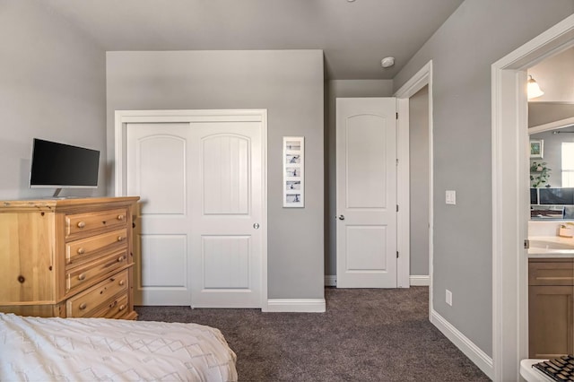 2076 Chennault Ave, Clovis, CA 93611 - bedroom with dark colored carpet and a closet