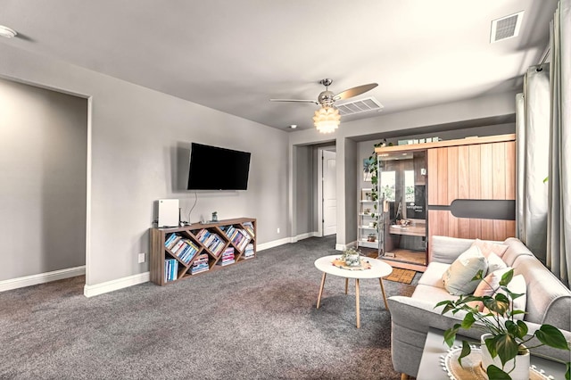 2076 Chennault Ave, Clovis, CA 93611 - carpeted living room featuring a ceiling fan and baseboards