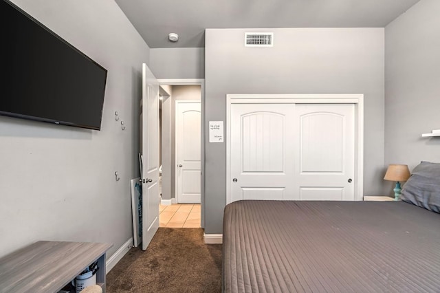 2076 Chennault Ave, Clovis, CA 93611 - bedroom with dark colored carpet and a closet