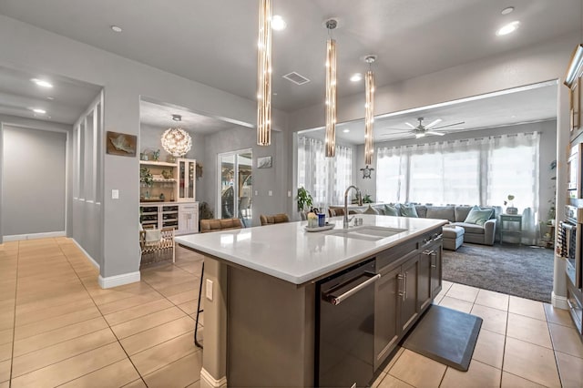 2076 Chennault Ave, Clovis, CA 93611 - kitchen with dishwasher, open floor plan, light tile patterned floors, light countertops, and recessed lighting
