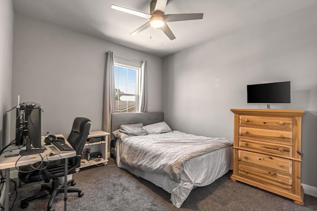 2076 Chennault Ave, Clovis, CA 93611 - bedroom with dark carpet, an office area, and ceiling fan