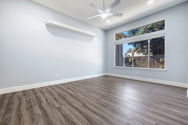 5667 W Bluff Ave, Fresno, CA 93722 - spare room with wood finished floors, ceiling fan, and recessed lighting