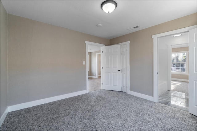 2401 E Hedges Ave, Fresno, CA 93703 - unfurnished bedroom featuring carpet flooring and a closet