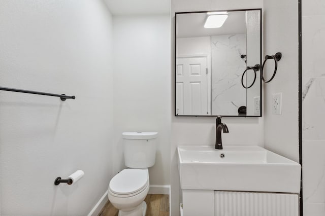 1931 W Ashlan Ave, Fresno, CA 93705 - bathroom with vanity and wood finished floors