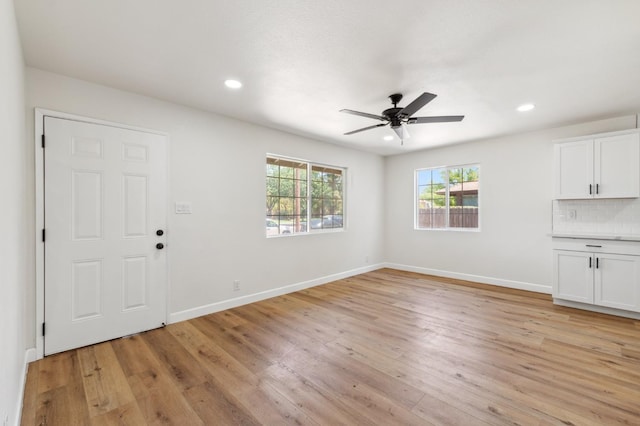 1931 W Ashlan Ave, Fresno, CA 93705 - unfurnished living room featuring light wood-type flooring, ceiling fan, and recessed lighting