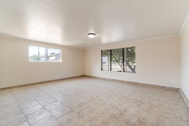 2738 S Fairway Ct, Visalia, CA 93277 - spare room with plenty of natural light and ornamental molding